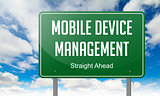 Mobile Device Management on Highway Signpost.