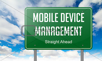 Mobile Device Management on Highway Signpost.