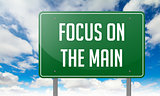Focus on the Main in Highway Signpost.