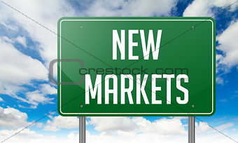 New Markets on Highway Signpost.