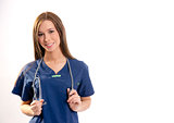 Beautiful Brunette Nurse Holds Her Stethoscope Looking at Camera