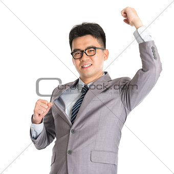 Asian businessman celebrating success
