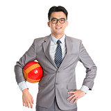 Asian businessman with soccer ball