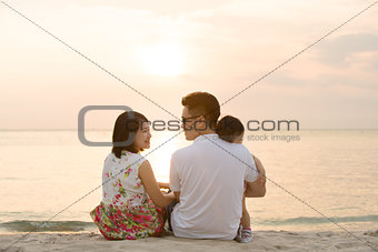 Asian family at outdoor beach