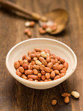 rustic raw uncooked peanuts