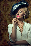 Young woman with vintage style in jewelry