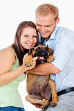 Portrait of a Happy Young Couple with a Dog.