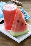fresh sweet watermelon smoothie on a wooden table