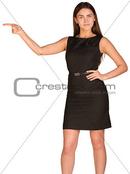 Businesswoman pointing her finger aside