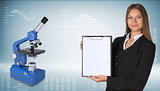 Businesswoman with blue chemistry microscope