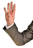 Businessman in suit shows four fingers