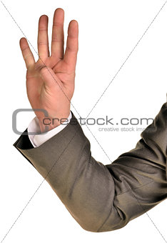 Businessman in suit shows four fingers