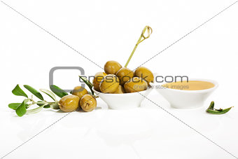 Delicious green olives background.