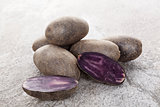 Raw purple potatoes.