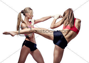 Two attractive athletic girls fighting