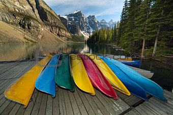 canoes by the mountain lake