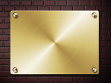 Gold plate on brick wall