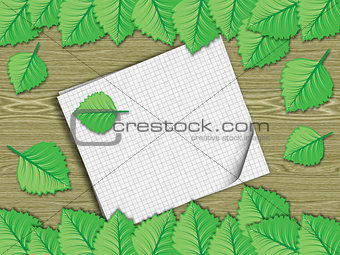 Fresh leaves over wooden background