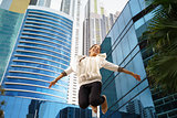 latina business woman jumping joy happy office smile