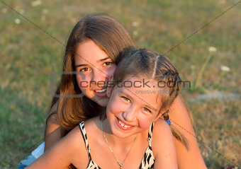 Outdoor portrait of two girls.
