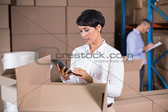 Pretty warehouse manager using calculator