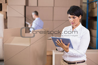 Pretty warehouse manager using tablet pc
