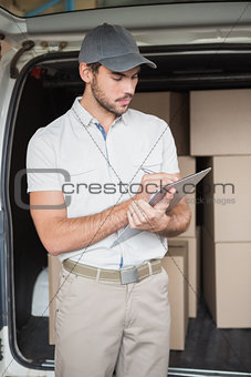 Delivery driver checking his list