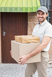 Delivery driver walking with parcels