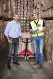 Warehouse manager and foreman working together