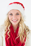 Attractive young woman wearing santa hat