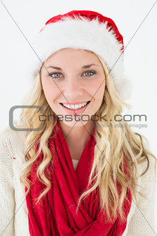 Attractive young woman wearing santa hat