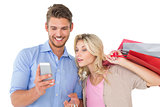 Young couple looking at mobile phone