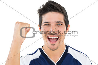 Close up portrait of football player cheering