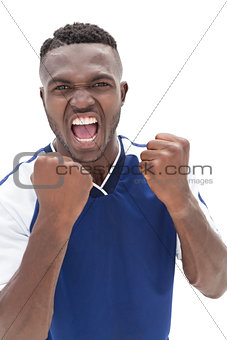 Portrait of a football player shouting
