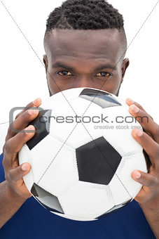 Close up portrait of a serious football player