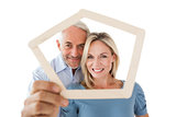 Mature couple looking through frame