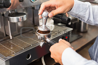 Barista making a cup of coffee