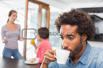 Handsome man enjoying his coffee