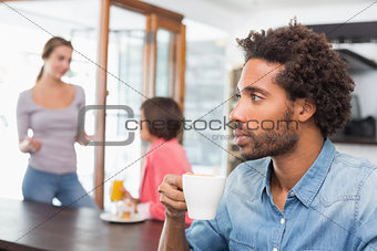 Handsome man enjoying his coffee