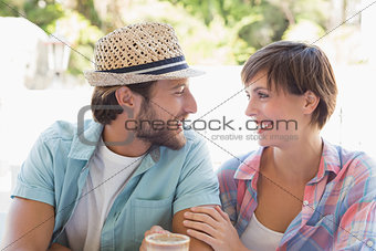 Happy couple enjoying coffee together