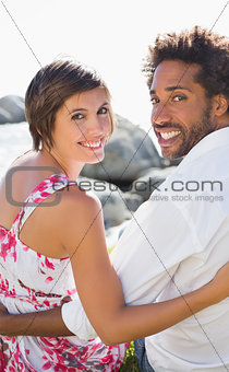 Gorgeous couple smiling at camera