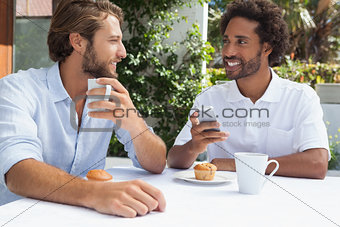 Two friends enjoying coffee together