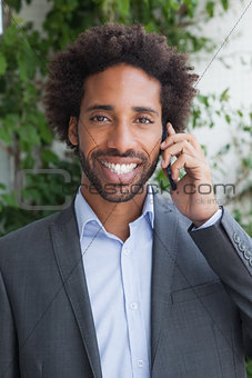 Handsome businessman on the phone