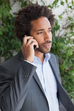 Handsome businessman on the phone