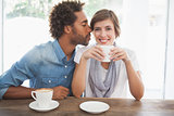 Casual couple having coffee together