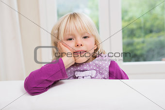 Cute little girl on the couch