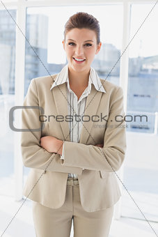 Pretty businesswoman looking at camera