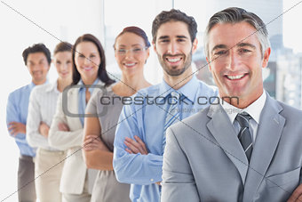 Smiling employee's in a line