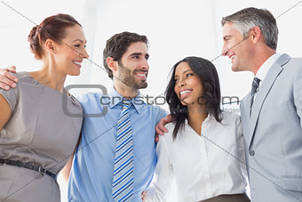 Smiling employee's standing all together