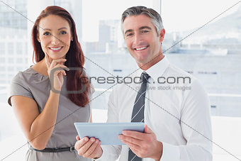 Business people smiling at camera